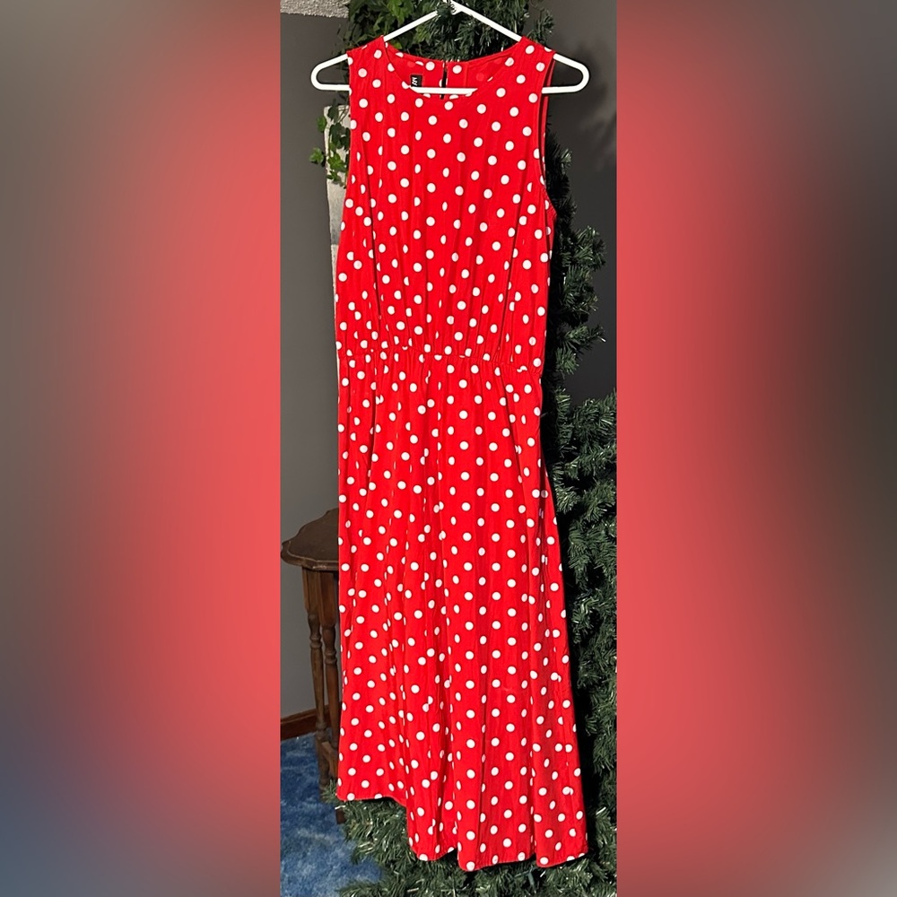 My Michelle dress red polka dot has elastic waist band hits about mid-shin